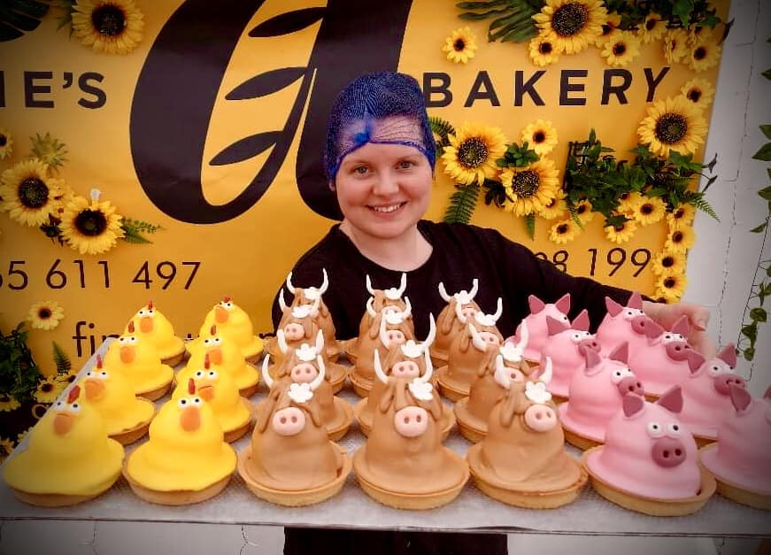 Annie Body of Annie’s Bakery with her adorable fondant cup characters.