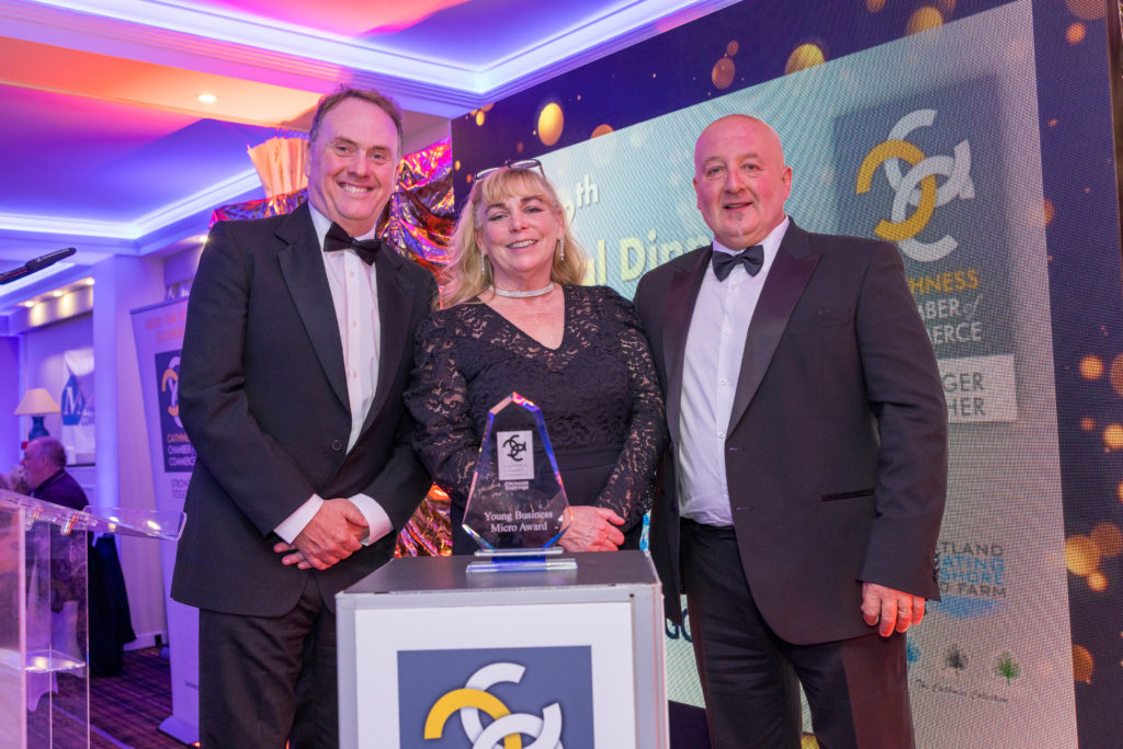 Winner of the Young Business Award in the Micro category, Mandy Boydell and Ged Boydell of CC Chocolatier with award sponsor Rob Heaton, West of Orkney Windfarm